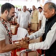 Congress leader Rahul Gandhi exchanges greetings with Rajasthan Chief Minister Ashok Gehlot; (Photo: ANI)