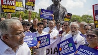 Opposition parties protest outside the Parliament